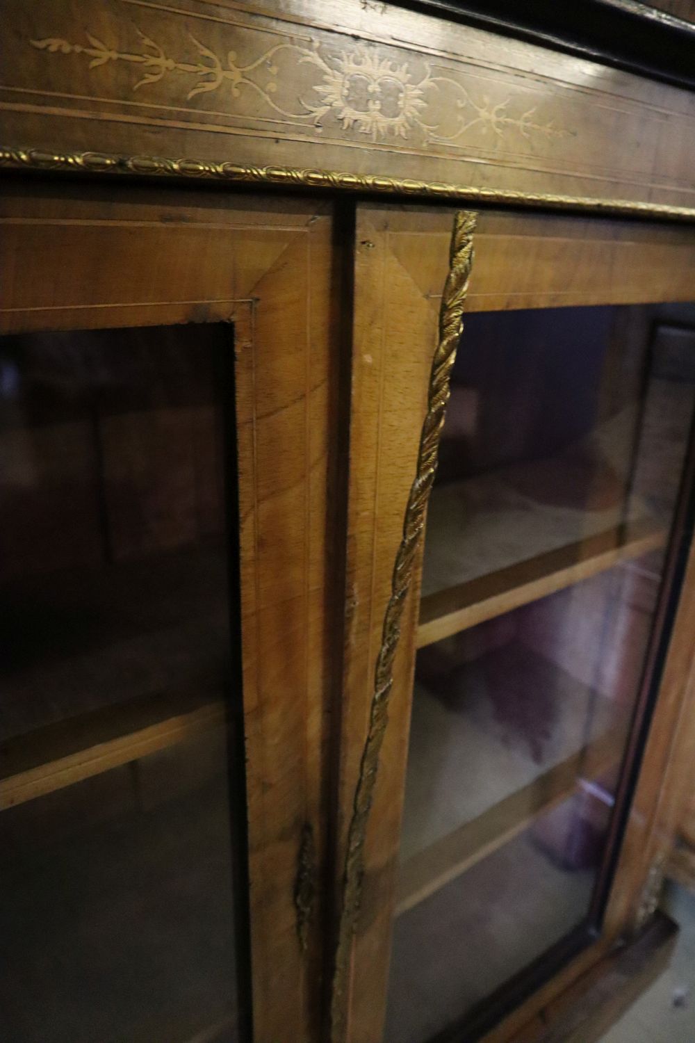A late Victorian figured walnut gilt metal mounted pier cabinet, width 96cm, depth 32cm, height 99cm